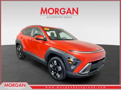 2024 Hyundai Kona SEL in Soultronic Orange Pearl — front three-quarter view