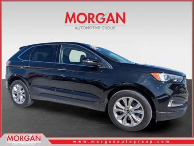 2024 Ford Edge Titanium in Agate Black Metallic — front three-quarter view