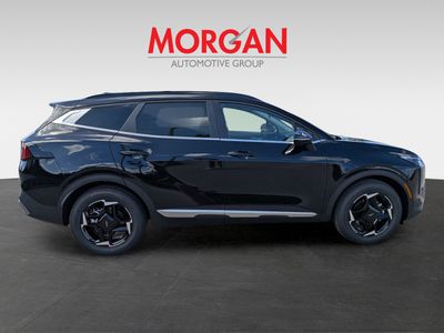 2026 Kia Sportage — rear three-quarter view