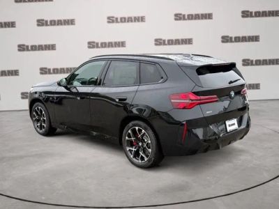 2026 BMW X3 — rear three-quarter view