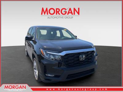 2025 Honda Passport EX-L in Black — front three-quarter view