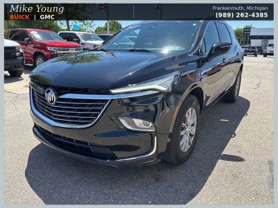 2023 Buick Enclave Essence in Ebony Twilight Metallic — front three-quarter view
