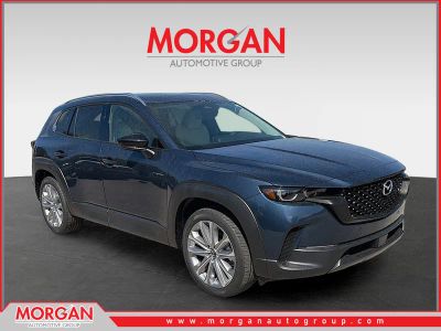 2026 Mazda CX-50 2.5 S Premium in Ingot Blue Metallic — front three-quarter view