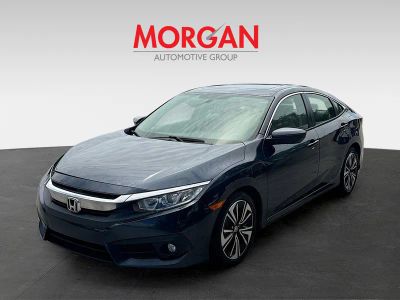 2016 Honda Civic Sedan — rear three-quarter view
