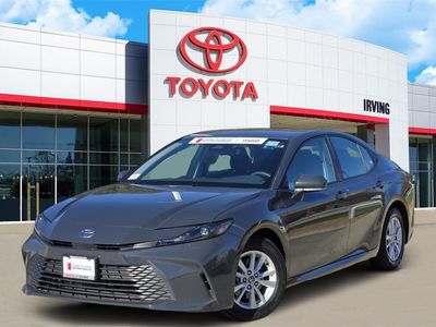 2025 Toyota Camry LE in Black — front three-quarter view