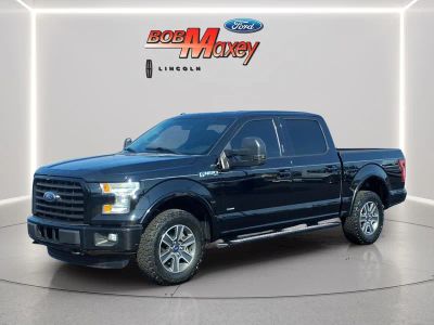 2016 Ford F-150 XLT in Shadow Black — front three-quarter view