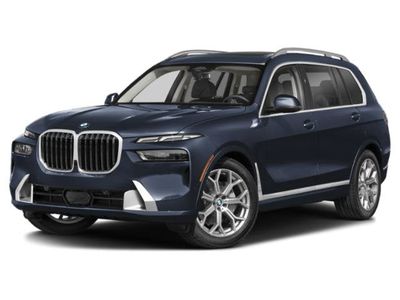 2026 BMW X7 xDrive40i in Carbon Black Metallic — front three-quarter view