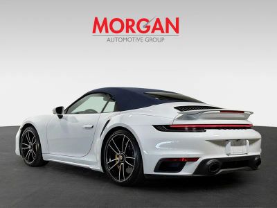 2023 Porsche 911 — rear three-quarter view