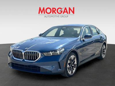2025 BMW 5 Series — rear three-quarter view
