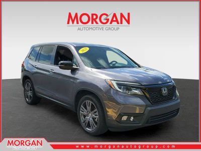 2021 Honda Passport EX-L in Modern Steel Metallic — front three-quarter view
