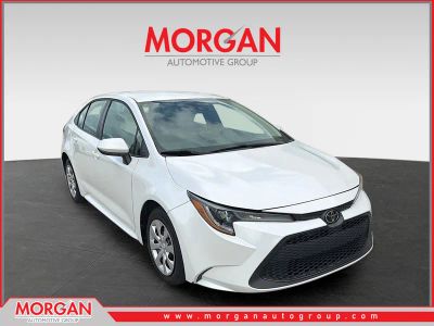 2022 Toyota Corolla LE in Pearl — front three-quarter view