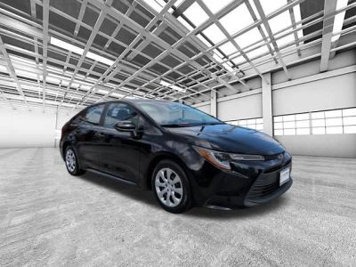 2024 Toyota Corolla LE in Black — front three-quarter view