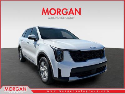 2026 Kia Sorento LX in Glacial White Pearl — front three-quarter view