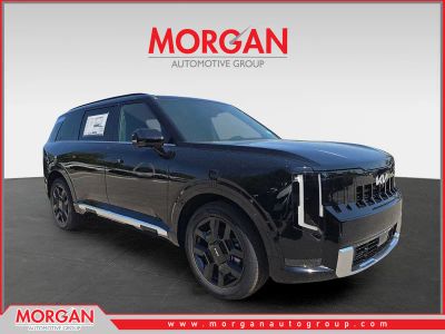 2027 Kia Telluride Hybrid SX-Prestige in Ebony Black — front three-quarter view