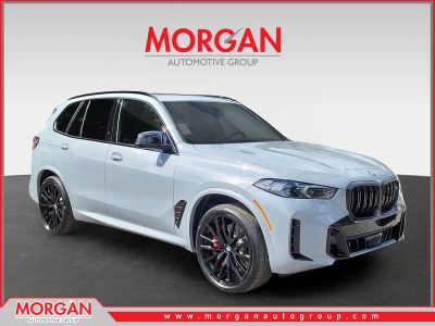 2026 BMW X5 M60i in Brooklyn Grey Metallic — front three-quarter view
