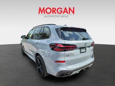 2026 BMW X5 — rear three-quarter view