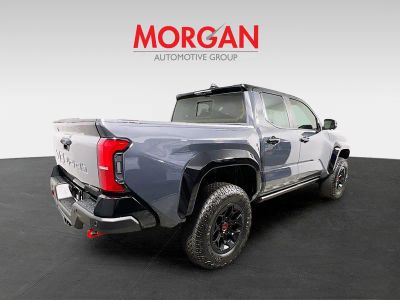 2026 Toyota Tacoma Hybrid — rear three-quarter view