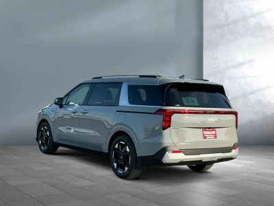 2026 Kia Carnival — rear three-quarter view
