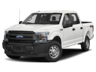 2018 Ford F-150 LARIAT in Stone Gray — front three-quarter view
