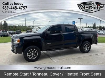 2021 GMC Canyon 4WD AT4 w/Leather in Onyx Black — front three-quarter view