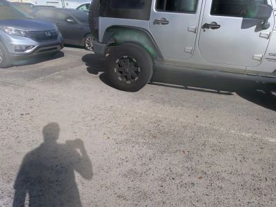 2012 Jeep Wrangler — rear three-quarter view
