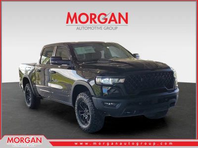 2026 Ram 1500 Rebel in Diamond Black Crystal Pearlcoat — front three-quarter view