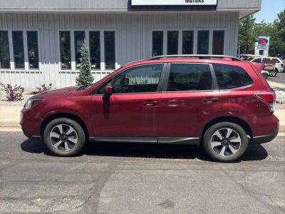 2018 Subaru Forester Premium in Venetian Red Pear — front three-quarter view