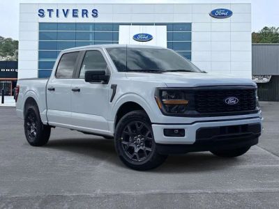 2026 Ford F-150 STX in White — front three-quarter view