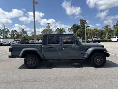 2026 Jeep Gladiator Sport S in Anvil Clearcoat — front three-quarter view