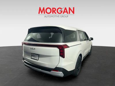 2026 Kia Carnival — rear three-quarter view
