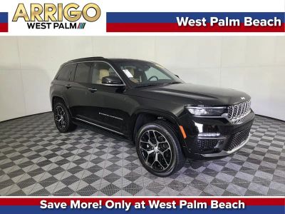 2024 Jeep Grand Cherokee Summit Reserve in Black — front three-quarter view