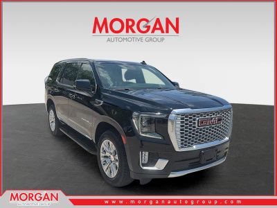 2023 GMC Yukon Denali in Onyx Black — front three-quarter view