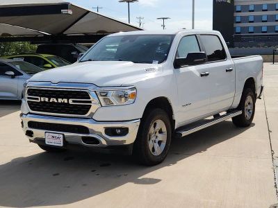 2024 RAM 1500 Big Horn/Lone Star in Bright White Clearcoat — front three-quarter view