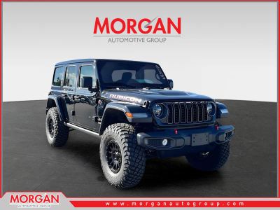 2025 Jeep Wrangler Rubicon in Black — front three-quarter view