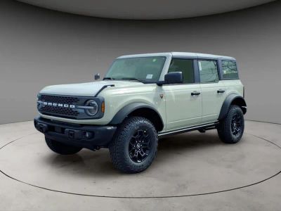 2026 Ford Bronco Badlands in Tan — front three-quarter view