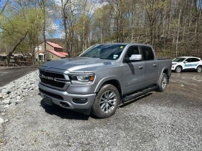 2021 RAM 1500 Laramie Crew Cab 4x4 5'7" Box in Silver — front three-quarter view