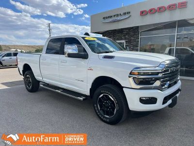 2026 RAM 2500 Laramie in Bright White Clearcoat — front three-quarter view