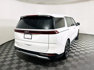2024 Kia Carnival — rear three-quarter view