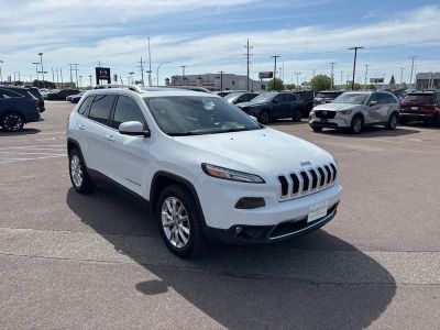 2015 Jeep Cherokee — rear three-quarter view