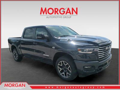 2026 Ram 1500 Laramie in Blue — front three-quarter view