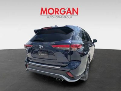 2023 Toyota Highlander — rear three-quarter view