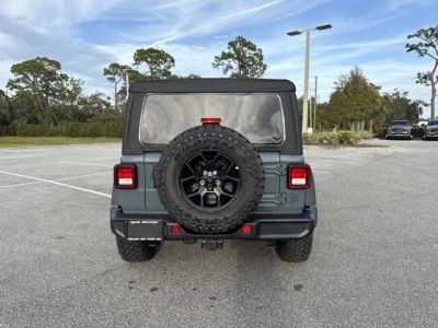 2026 Jeep Wrangler — rear three-quarter view