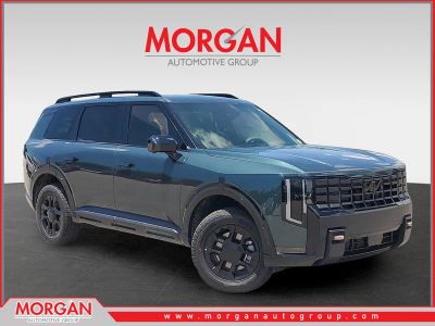 2027 Kia Telluride X-Pro SX-Prestige in Black Jade Green — front three-quarter view