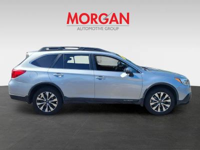 2015 Subaru Outback — rear three-quarter view