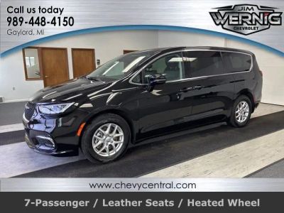 2024 Chrysler Pacifica Touring L in Black — front three-quarter view