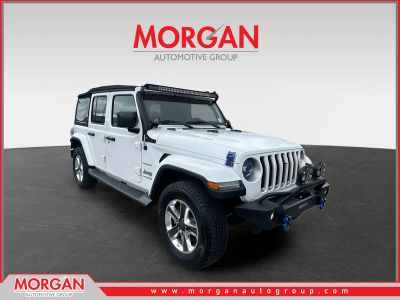 2018 Jeep Wrangler Unlimited Sahara in Bright White Clearcoat — front three-quarter view