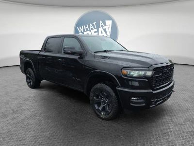 2026 RAM 1500 Big Horn/Lone Star in Diamond Black Crystal Pearlcoat — front three-quarter view