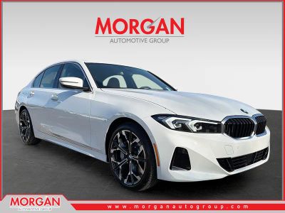 2026 BMW 3 Series 330i in Alpine White — front three-quarter view