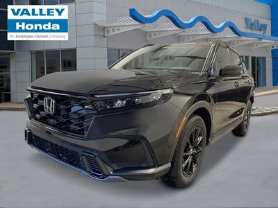2026 Honda CR-V Hybrid Sport-L in Crystal Black Pearl — front three-quarter view