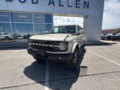 2025 Ford Bronco Outer Banks in Desert Sand — front three-quarter view